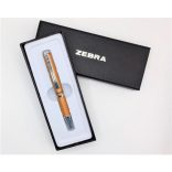 Golyóstoll, 0,24 mm, teleszkópos, arany színű tolltest, ZEBRA "SL-F1", kék